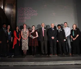 The winning team with their award