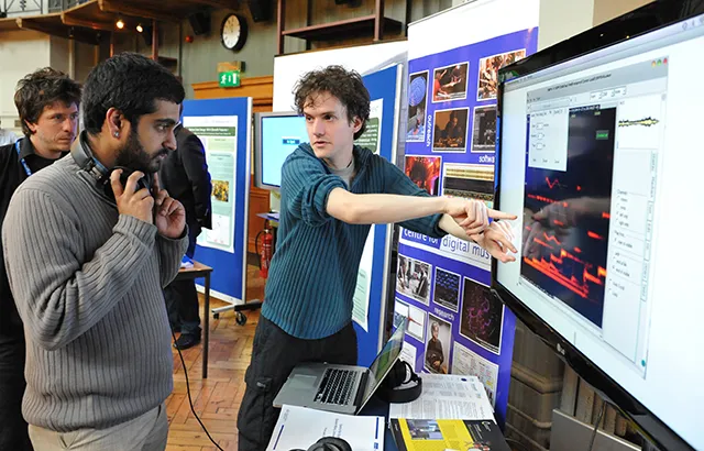 Dr Daniel Stowell explaining his research