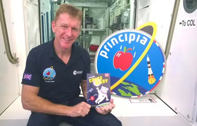 Tim Peake with the Space Diary (c) Curved House