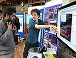 Dr Daniel Stowell explaining his research