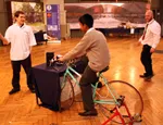 Year 10 St Paul's Way pupil Wahid Uddin tries out the disco bike