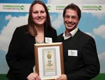 Emma Baker and Rik Husdan of Student and Campus Services collect Queen Mary's Good Egg Award.