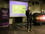 Simone Fattouche speaking at a QMUL event