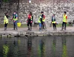 Students clearing litter from the canal