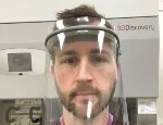 Dr John Connelly wearing the new 3D-printed visor