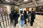 CCLS Students listening to a tour guide speak about Lloyd's of London, whilst getting a tour of their building.