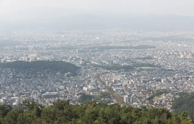 An aerial view of Kyoto with visible air pollution