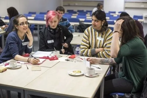 Students sitting around a table