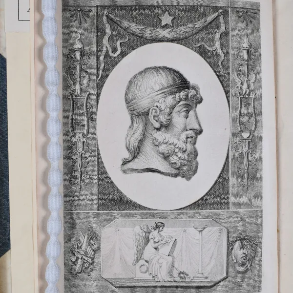 Book plate showing profile of Plato surrounded by decorative Grecian imagery.