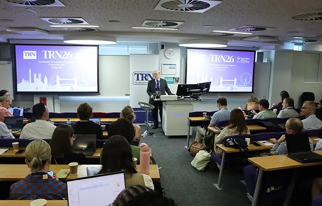 Professor Bernard Schneider addressing attendees of the Tax Research Network 2026.