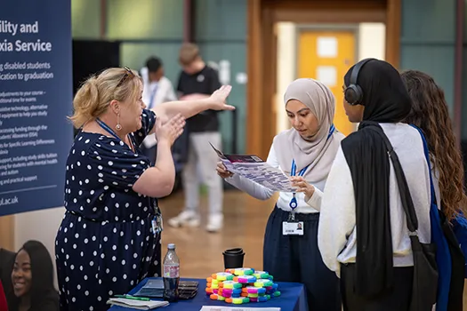 Students at an Open Day discussing course options