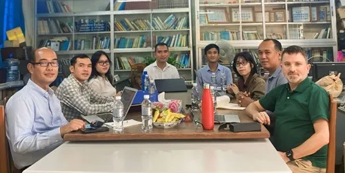 Full Cambodian team meeting at the Royal University of Phnom Penh.