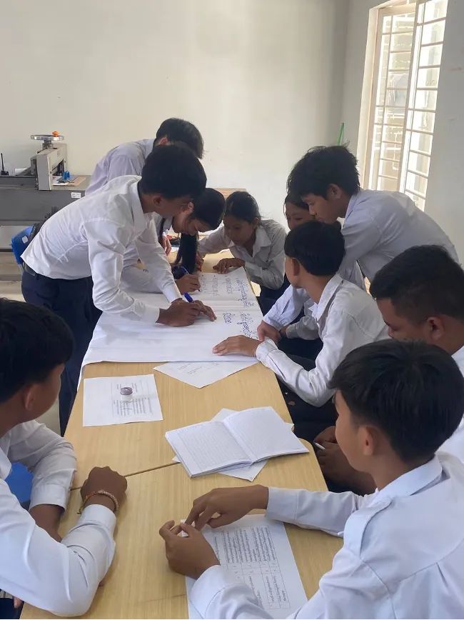 Students working at a desk