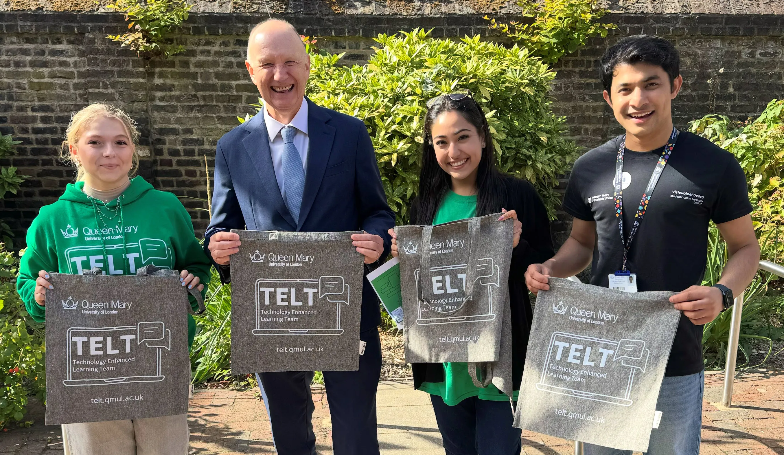 Two TELT Ambassadors with Colin Bailey and the QMSU President
