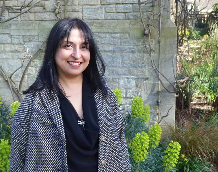 Photo of Surjit in a garden