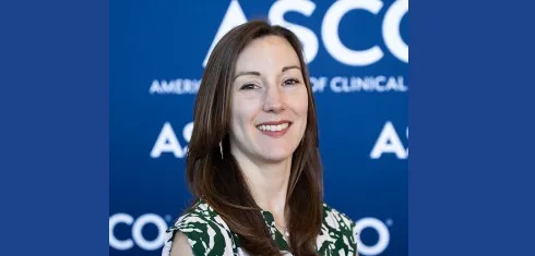 A picture of Alison Berner against a blue background