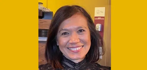 A picture of Dr Jasmine Murphy against a yellow background