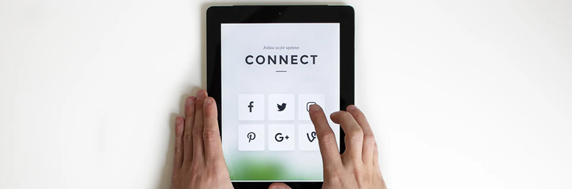 person using social media on a tablet