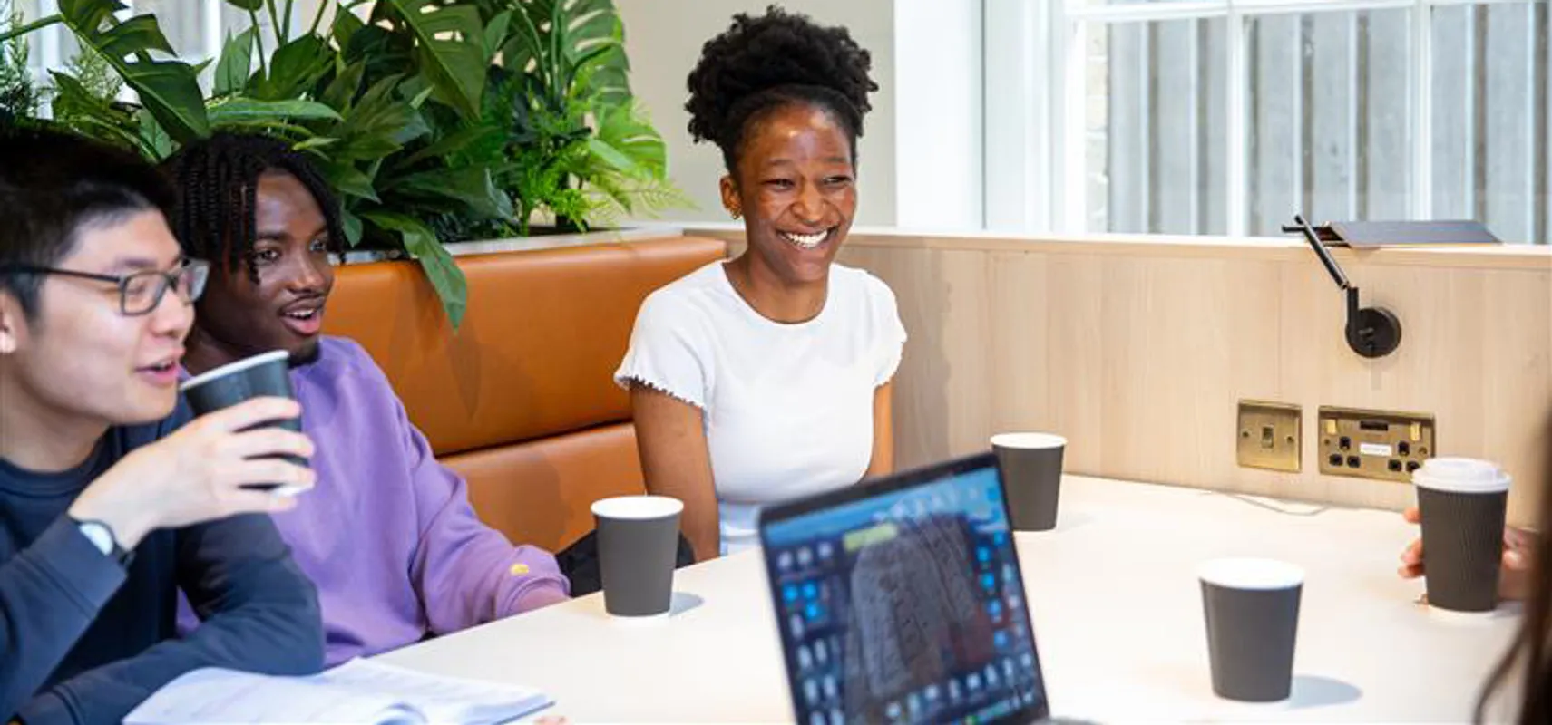 students meeting around a table