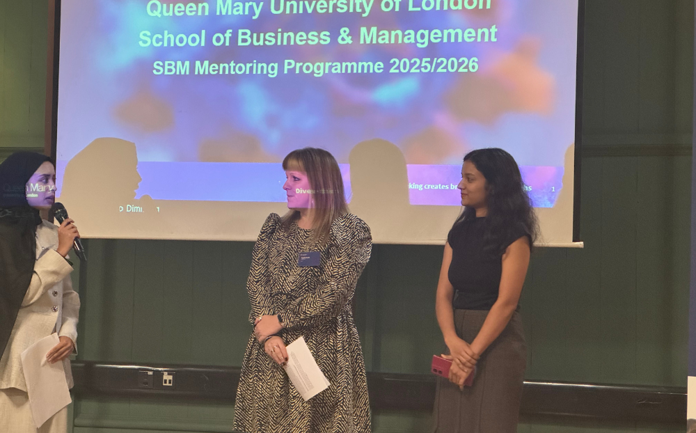 Image of Naima Zanat talking with Sophie Harris and Anna Panthrose on stage at the mentoring launch event