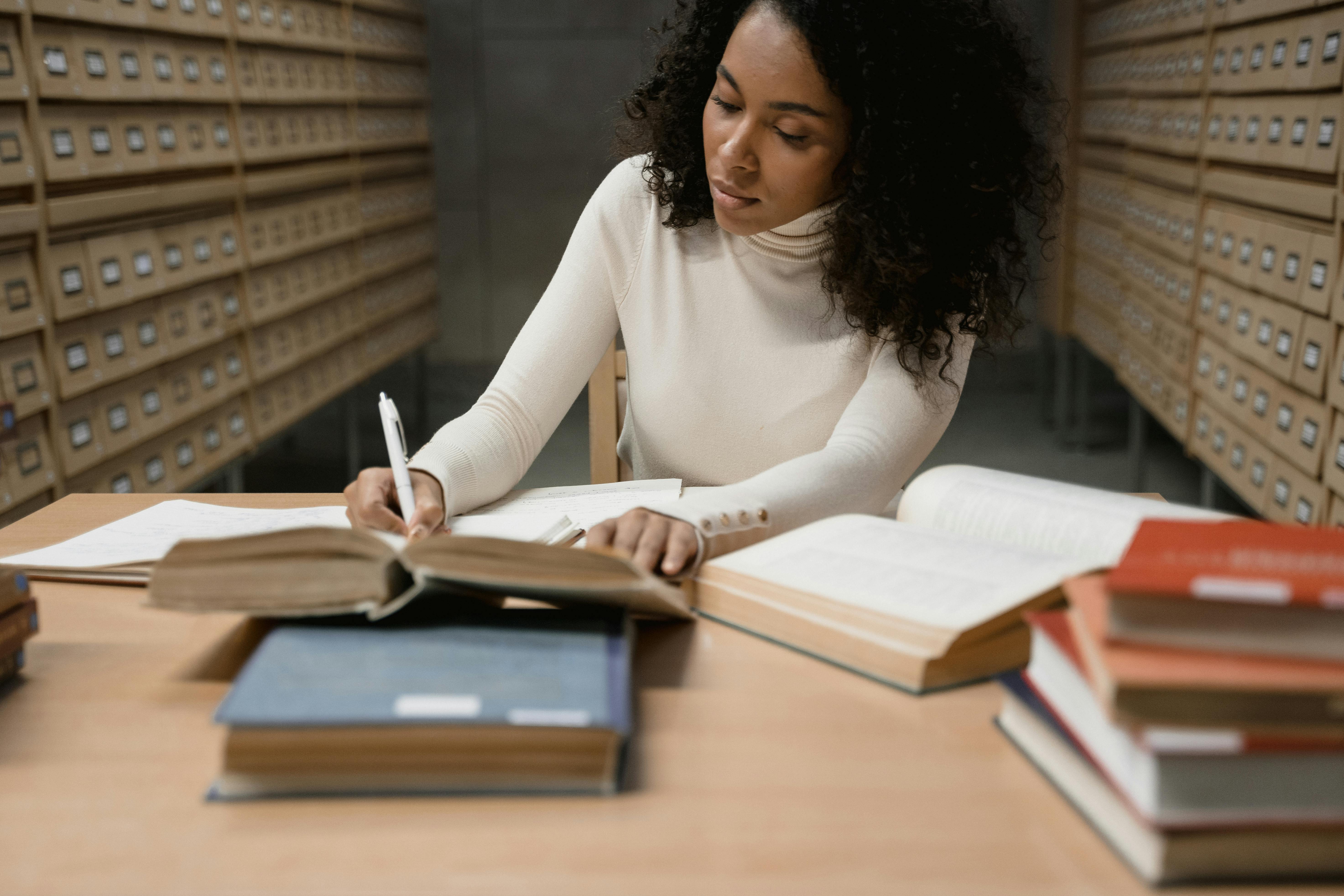 Female student studying at a desk