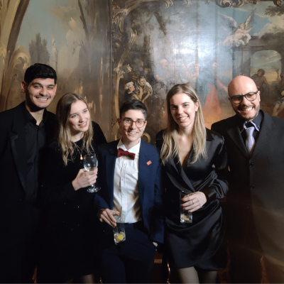 Dr Luigi Ombrato and his team of researchers from the Barts Cancer Institute at a black tie Burns Night celebration.